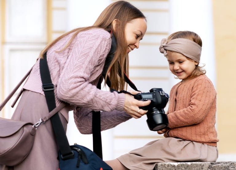 Child at a professional photoshoot with photographer